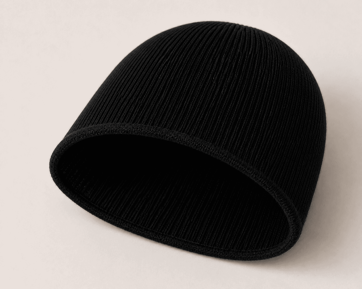 Nūr Signature Beanie in Noir, skully inside construction detail