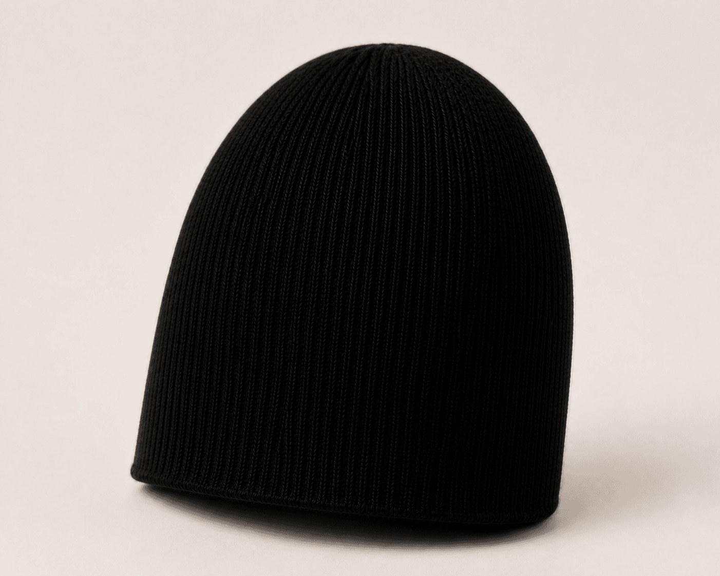 Nūr Signature Beanie in Noir, skully rear three-quarter view