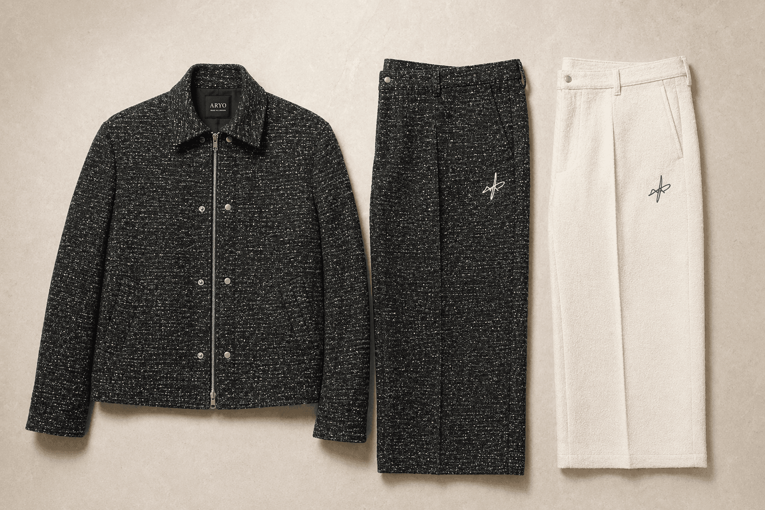 ARYO Pennicella jacket and trousers arranged in an editorial still life